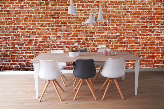 Photo wallpaper with bricks.