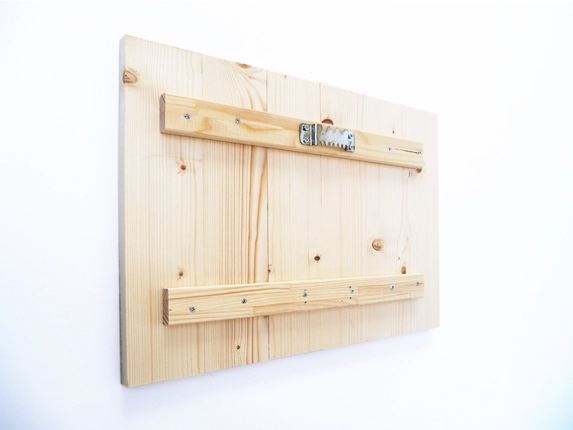 Back of photo on pine wood, sturdy hanging bracket.