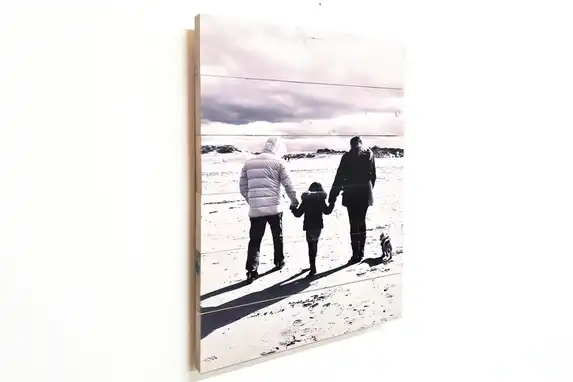Atmospheric family photo printed on scaffolding wood.