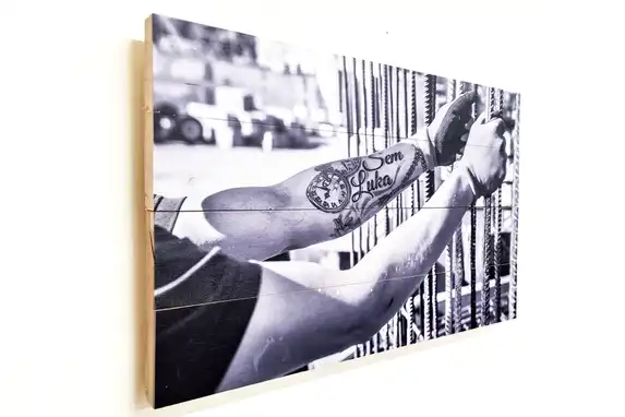 Black and white photo on scaffolding wood.
